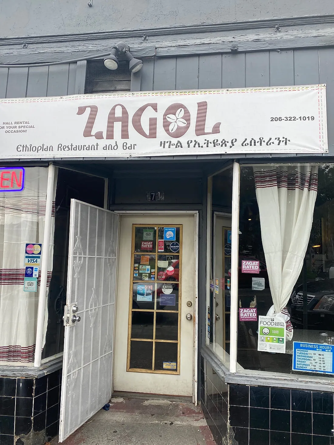 The Zagol Ethiopian Restaurant and Bar storefront on E Cherry Street, Seattle, with its painted banner sign